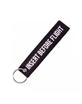 Breloc moto textil "Insert before flight" Negru