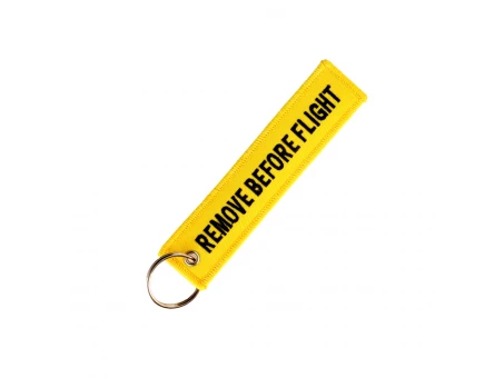 Breloc moto textil "Remove Before Flight" Galben